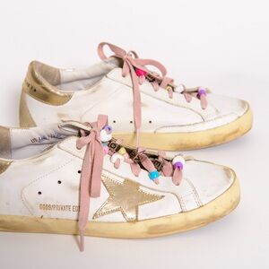 Golden Goose Women's White and Gold Sneakers with Pink Accents